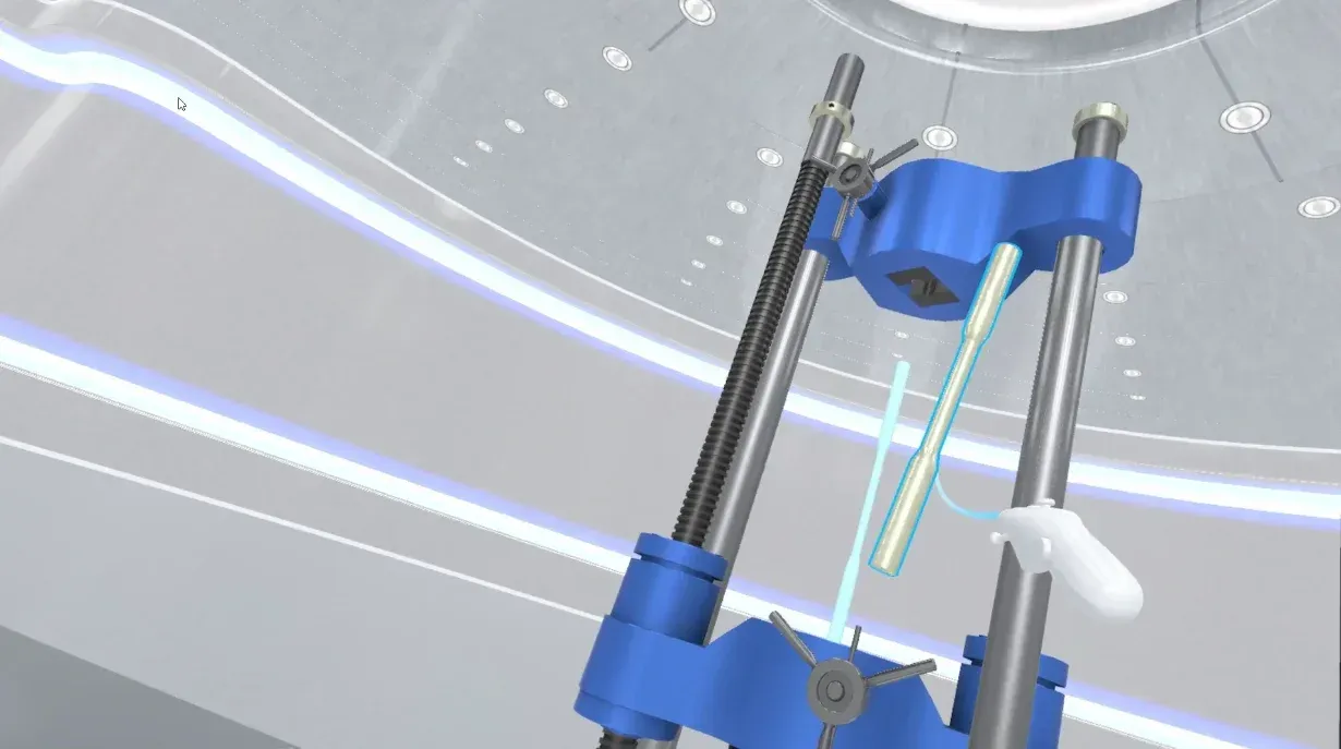 Close-up of a test specimen mounted between the grips of the virtual UTM