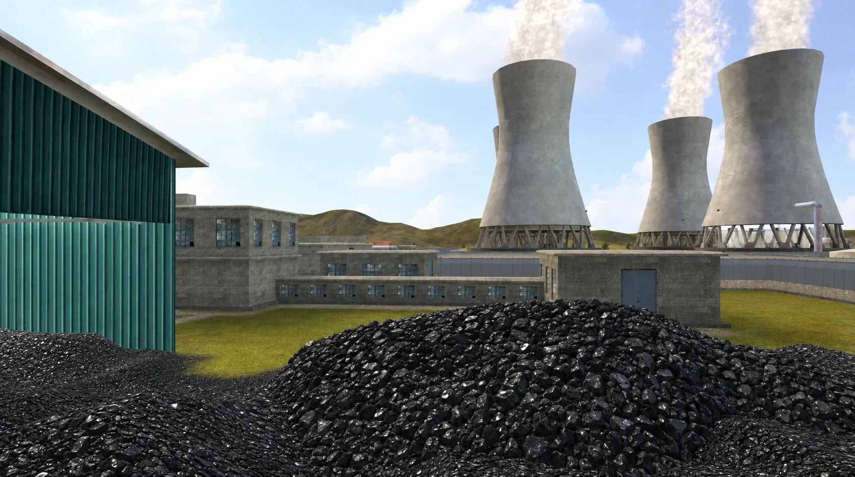 Coal stockpile in the fuel yard of a thermal power plant with cooling towers venting steam behind